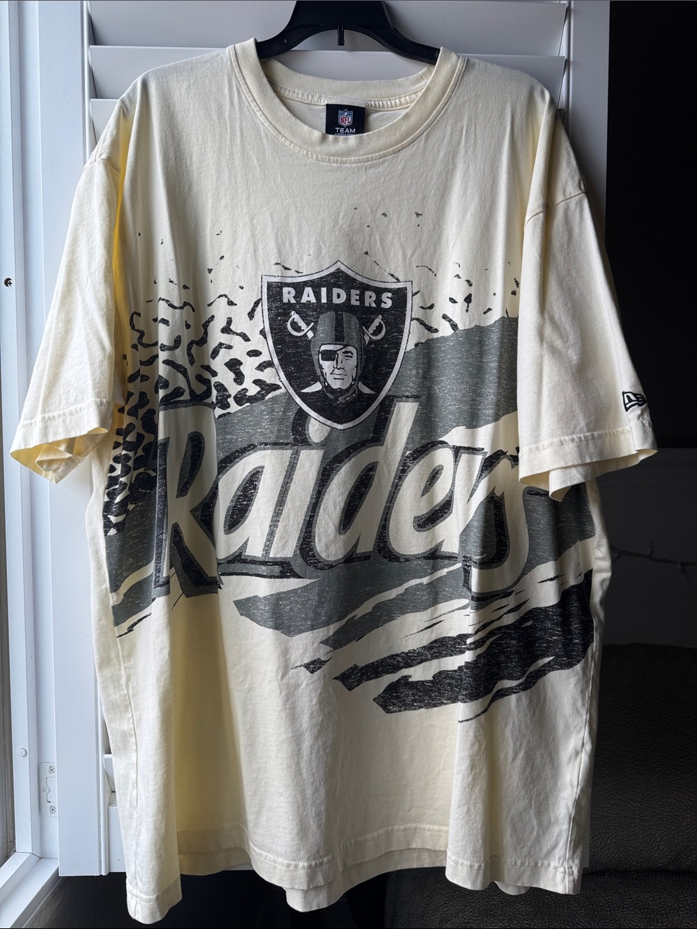 New Era Cream and Black Raiders Graphic Tee NWOT